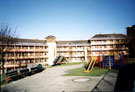 Playground enclosed by Edward Street Flats