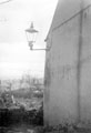 Gas lamp fixed to a house end in the Wadsley area