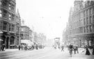 View: t00978 High Street, Foster's Buildings, right, including Nos. 10 - 16 William Foster and Son, tailors, premises on left include No. 3 Union of London and Smiths Bank, No. 7 London City and Midland Bank, No.13 Castle Chambers and old Telegraph Offices