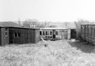 William Tyzack, Sons and Turner Ltd., Sports Pavilion (Old Nags Head huts at rear of Nag's Head Inn, Sheffield Road). Two old railway carriages which acted as sports pavilions, 1923-1931, right. The pavilion on the left was erected to replace these