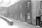 Rear of 165 - 175 (right to left), Woodside Lane and Nos. 1 and 3 (right to left), Wood Fold showing wall separating Court 25. Demolished January 1960