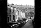 Nos. 1 - 6, Haddon Terrace (between Nos. 48 and 46), Woodside Lane looking towards housing on Fowler Street