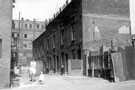 Court 15, Nos. 1 - 8, Woodside Lane looking towards Stanley Works (Great Britain) Ltd., tool manufacturers, Rutland Road. Demolished Feb. 1960