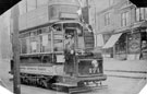 Tram No. 171 and the first conductress (Mrs Gladys M. Piggott) on the first tram to Crookes. Taken on Fulwood Road, No 498, William G. Thompson, Stationer, in background Tram No. 171 and the first conductress (Mrs Gladys M. Piggott) on the first tram to Crookes. Taken on Fulwood Road, No 498, William G. Thompson, Stationer, in background