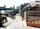 Construction of Ponds Forge Sports Centre, Pond Hill. Pond Street bus station, left