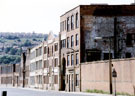 View: t01259 Derelict Firth Vickers, Staybrite Works, (formerly Thomas Firth and Sons), Weedon Street with housing on Wincobank Hill in the background