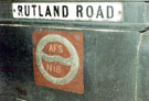Coloured World War II Auxiliary Fire Service sign and Rutland Road road sign, Rutland Road Bridge over the River Don