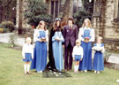 May Queen and Sunday School Captain (Lindsay ? and John Mellor) and attendants, outside Greenhill Methodist Church, School Lane