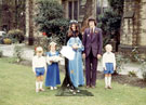 May Queen and Sunday School Captain (Lindsay ? and John Mellor) and attendants, outside Greenhill Methodist Church, School Lane