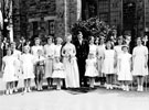 May Queen and Sunday School Captain (Gillian Cowling and Peter Haddock) and attendants, outside Greenhill Methodist Church, School Lane