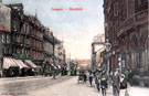 Fargate looking towards High Street, 1900 - 1905, including tram No. 110, No. 44 Green Dragon Hotel on left (later became Winchester House) and Davy's Buildings, Yorkshire Penny Bank, right