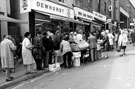 Dixon Lane showing No. 20 J.H. Dewhurst Ltd., butchers; No. 18 Home Farm Products Ltd., pork butchers; No. 22 W.J. King Ltd., provision dealers
