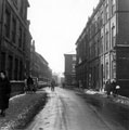 Bank Street at junction with Scargill Croft. Flint and Co., solicitors, with lamp. Sheffield County Court and Queen Street Chambers in background