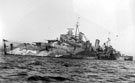 Cruiser, HMS Sheffield - The Shiny Sheff - in camouflage during World War Two