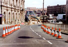 View: t01849 Commercial Street during the construction of Supertram, looking towards Park area. Old Gas Company Offices, known as Canada House, left. Park Hill Flats, right, in background