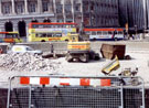 Filling in the 'Hole in the Road', Castle Square, High Street, during the construction of Supertram Filling in the 'Hole in the Road', Castle Square, High Street, during the construction of Supertram