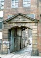 View: t01956 Carved details over doorway of Harrison Fisher and Co. Ltd., silversmiths, Trafalgar Works, Wellington Street