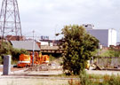 Worker Noddy Train, near Meadowhall South Supertram stop with Sheffield Road at Tinsley Bridge over the canal (centre)