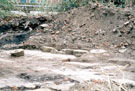 Archaeological dig at Exchange Riverside, Nursery Street, showing remains of grinding wheels