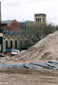 Archaeological dig at Exchange Riverside, Nursery Street, where remains of early cementation furnace were excavated. Former Holy Trinity Church in background