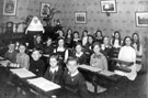 View: t02311 Pupils and Sister in a classroom at the Convent High School, No. 152 Burngreave Road