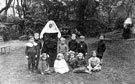 Pupils and Sister in the gardens of the Convent High School, No. 152 Burngreave Road