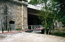 View: t02621 Completed Cobweb Bridge under Victoria Station Viaduct, Five Weirs Walk showing the Sussex Street end