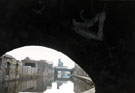 View of the derelict Parkers Wharf from underneath Cadman Street Bridge, Sheffield and South Yorkshire Navigation looking towards Midland Railway Bridge
