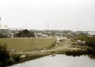 View: t02835 Construction of Supertramway between Worksop Road and Shirland Lane with Don Valley Stadium in the background (left) and South Yorkshire Navigation in the foreground