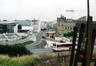 View: t02843 Starting construction of Bowstring Bridge and Supertram Viaduct, Commercial Street with Ponds Forge Sports Centre, Barclays Bank (left) and former Gas Offices (right)