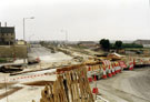 Construction at Woodbourn Road Supertram Stop showing the junction of Stadium Way (left) and Worthing Road (right) with the Pakistan Muslim Centre formerly Woodbourn Road County School in the background