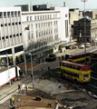 Construction of Castle Square Supertram stop looking towards C and A Modes Ltd., Nos. 59 - 65 High Street