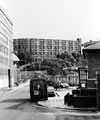 Pond Hill looking towards the Old Queens Head public head with the Pond Street bus station, right and Park hill Flats in the background