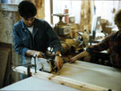 Sawing operative at Arundel Joinery, No. 151, Arundel Street