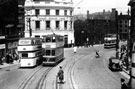 Sheffield Lane Top via Pitsmoor bound tram No. 118 and No. 17 bus on Waingate looking towards the junction with Bridge Street and Lady's Bridge with policeman on point duty showing Tennents Exchange Brewery and Lady's Bridge Hotel Sheffield Lane Top via Pitsmoor bound tram No. 118 and No. 17 bus on Waingate looking towards the junction with Bridge Street and Lady's Bridge with policeman on point duty showing Tennents Exchange Brewery and Lady's Bridge Hotel