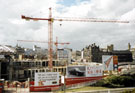 View: t03207 Construction of Ponds Forge Sports Centre, Sheaf Street with (right) Canada House (the old Gas Company offices), Commercial Street in the background