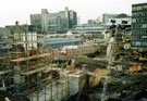 View: t03209 Construction of Ponds Forge Sports Centre, Sheaf Street with Pond Street Bus Station and Sheffield Hallam University, Owen Building  in the background