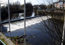 Hadfield Weir, River Don, near Meadowhall Shopping Centre with Transport and General Workers Union Building, Transport House, Meadow Hall Road (right)