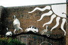 Car Mural Sculpture by Johnny White on the wall of Harratts Volvo Sheffield, Vulcan Foundry, Attercliffe Road