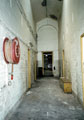View: t03414 Derelict interior of Nether Edge Hospital formerly part of Ecclesall Bierlow Union Workhouse with the Fire Reel in place