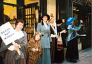 View: t03781 Sheffield Popular Arts - A Scene from the Suffragette Walking Tour, Chapel Walk outside what was formerly the office of the Sheffield Branch of the Women's Social Political Union (WSPU)