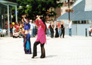 Aim to Dance, with Nisha Lal in the pink top, Chance to Dance outside Ruskins, Tudor Square with the Crucible Theatre in the background during refurbishment