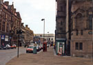 Surrey Street from the junction with Pinstone Street showing the former police box outside the Town Hall