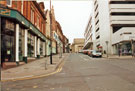 Cambridge Street from the junction with Cross Burgess Street looking towards Barkers Pool showing Nos. 38 - 40 Henry's Cafe Bar and Restaurant (left) and Cole Brothers, department store (right)