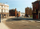 Waingate looking towards Lady's Bridge with Nos. 28 - 30 Tap and Barrel public house (formerly The Bull and Mouth Hotel); Royal Exchange Buildings Flats (right); The Lady's Bridge Hotel and former William and Glyns Bank left 