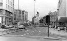 View: t04119 High Street from the junction with Haymarket looking towards the Hole in the Road; Rackhams, department store (left) and Kemsley House