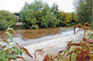 View: t04538 River Don in flood at, Walk Mill Weir, Five Weirs Walk, Effingham Street