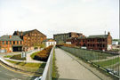 View: t04560 Park Square Footbridge looking towards Terminal Warehouse (left); Straddle Warehouse (centre) and Canal Basin Offices (right), Sheffield and South Yorkshire Navigation 