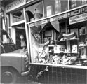 Van crashed into J.G. Powell Chemist Ltd., No. 152 Sharrow Lane with Mrs. Nora Ferrie who had a lucky escape standing in the doorway