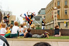 View: t04700 Korean Dance Team, Tudor Square during the World Student Games Cultural Festival with the Town Hall  Extension in the background 